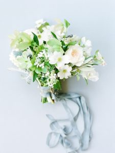 Nashville Wedding Photographer- Whimsical and natural white bridal bouquet with blue/gray silk ribbon on gray styling board