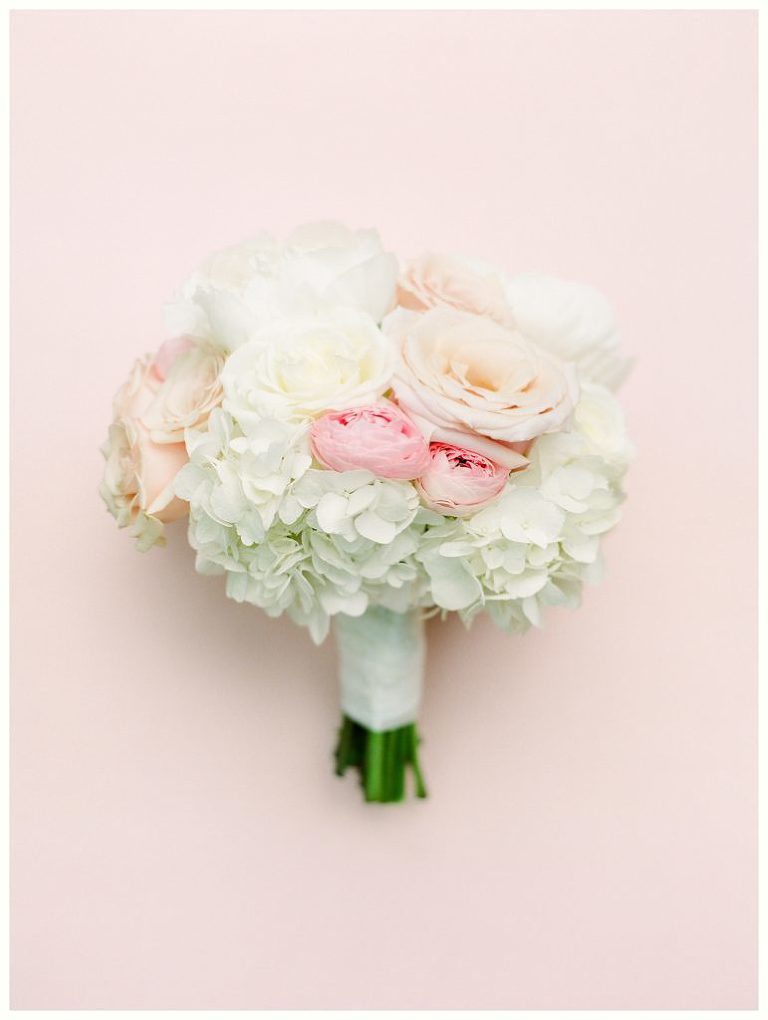 Spring Belle Meade Plantation Wedding with traditional white bouquet with pops of pink ranunculus and peonies